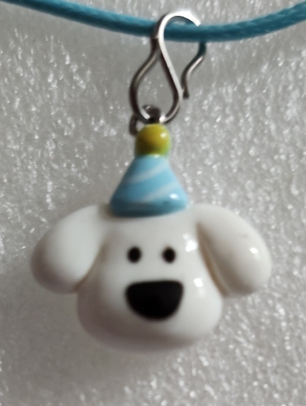 Hand Crafted White Dog Charm Pendant with Blue and Yellow Hat